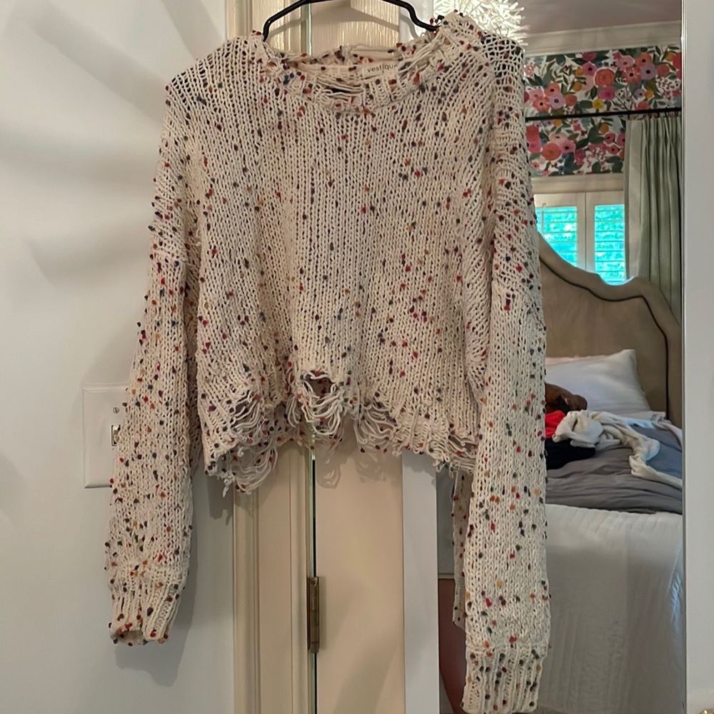 Small vestique sweater